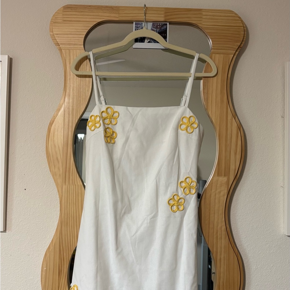 White Dress with Yellow Flower Accents